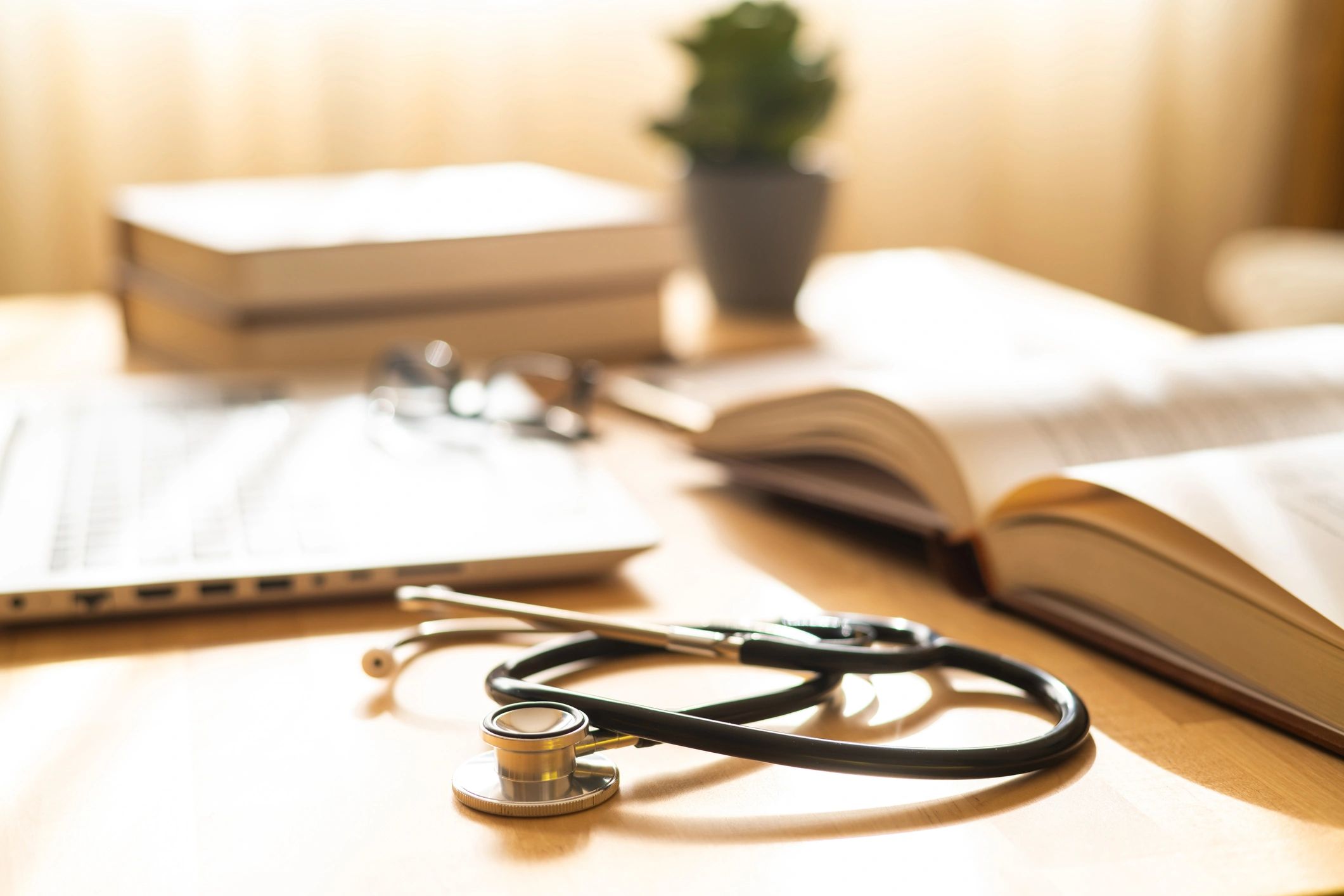 Medical notepad and stethoscope in a professional office